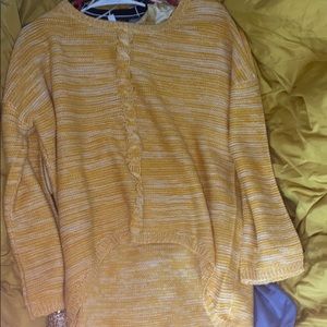 A yellow sweater